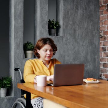 1587480497-woman-with-disability-working-from-home